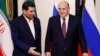 Iranian First Vice President Mohammad Mokhber (left) and Russian Prime Minister Mikhail Mishustin met in Bishkek on October 25.