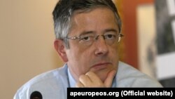 Roland Marchal was allowed to return home to France after 9 1/2 months in jail.