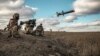  Українські військовослужбовці використовують американський ракетний комплекс «Джавелін» (Javelin) під час військових навчань на Донеччині, 23 грудня 2021 року