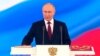 Președintele rus Vladimir Putin depune jurământul în timpul unei ceremoniei de învestire. 7 mai 2024. Captură video, Reuters. 