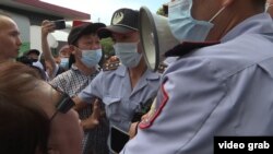 Activists clash with police in Almaty, Kazakhstan, at a protest against the rising influence of China and increasing food prices in July.