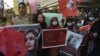 Protesters attend a demonstration in Karachi on December 24 after Pakistani human rights activist Karima Baloch was found dead in Toronto two days earlier.