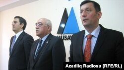 Azerbaijani opposition leaders Ali Kerimli, Isa Qambar, and Yusif Bagirzade (left to right) attend the meeting in Baku.