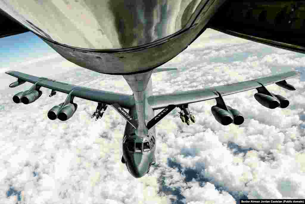 An Air Force B-52 Stratofortress refueling during a bombing mission over Syria in February 2017. After the regime-aligned forces attacked the Kurdish base, American aircraft and artillery were used to pummel the attackers. At least dozens were killed in the "inferno," including many Russian mercenaries.