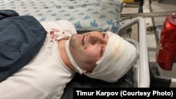 Miraziz Bazarov arrives at the hospital in Tashkent on March 28.