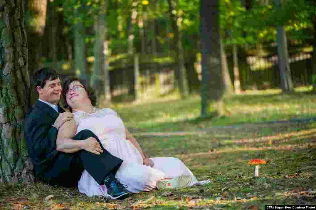Third Prize, General News: A couple celebrates their engagement at a facility for mentally disabled people in Hvozdy, Czech Republic. (Stepan Hon)