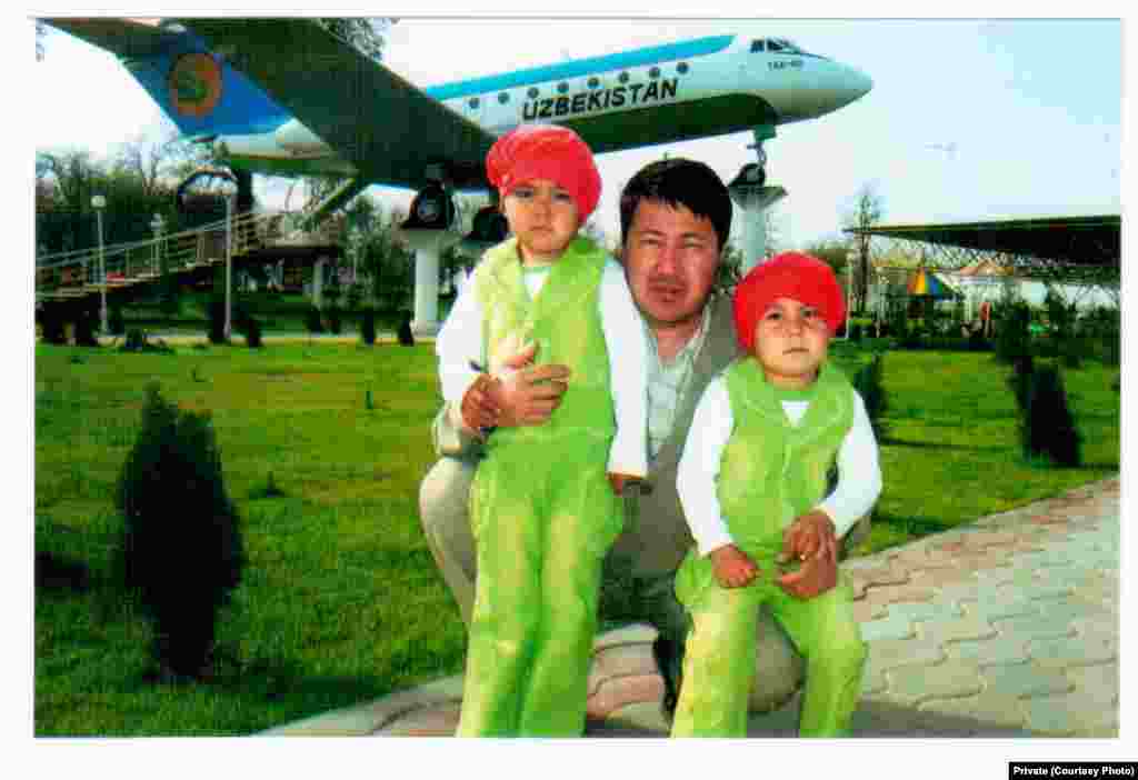 Rights activist Chuyan Mamatkulov, imprisoned in Navoi, photgraphed with his two children in Kashkadarya Province.