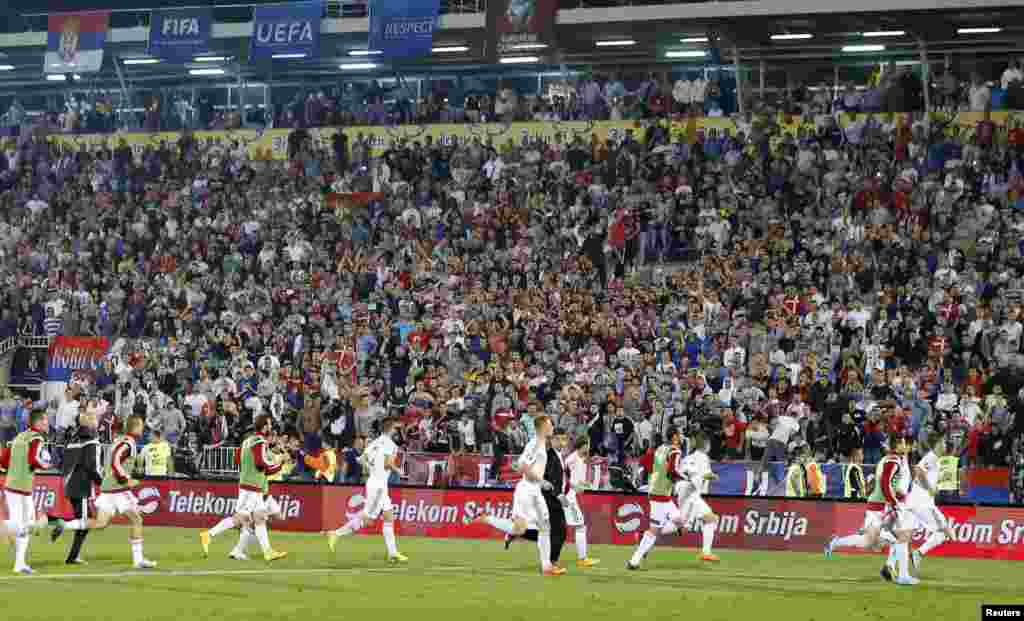 After about a minute of dangerous chaos and the crowd seemingly at fever pitch but the worst of the violence seemingly over, the Albanian team broke for the tunnel.