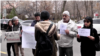 Armenian supporters of jailed Iranian rights lawyer Nasrin Sotoudeh gather outside Iran’s Embassy in Yerevan on March 19 to call for her release.