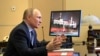 Președintele Vladimir Putin conduce o întâlnire online a Consiliului de Securitate al Rusiei în 16 aprilie 2021.