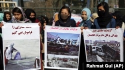 Despite the signing of a new peace deal with the Taliban, some Afghan women rallied on March 2 to remind their compatriots of the repressive practices that prevailed in the country when the extremist group was in power.