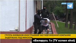 Кадр із репортажу державного телебачення Білорусі про затримання бойовиків «Вагнера» під Мінськом