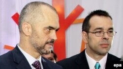 Albanian Prime Minister Edi Rama (left) and his brother, Olsi Rama, whom some blamed for the drone stunt that set off the football melee. (file photo)