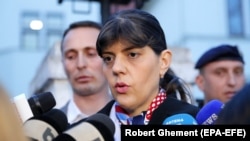 Laura Koevesi speaks to reporters in Bucharest on March 7.