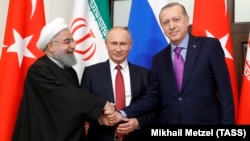 (Right to left:) Turkish President Tayyip Erdogan, Russian President Vladimir Putin and Iranian President Hassan Rohani at a meeting in Sochi in November 2017.