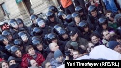 Russian police break up a rally in support of free assembly in Moscow.